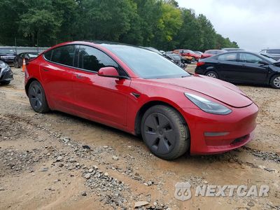 Czwarte zdjęcie samochodu z boku: 2021 TESLA MODEL 3 VIN:5YJ3E1EA2MF053716 - miniatura