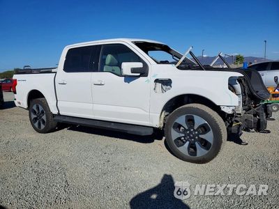 Czwarte zdjęcie samochodu z boku: 2023 FORD F150 LIGHTNING PRO VIN:1FT6W1EV1PWG25629 - miniatura