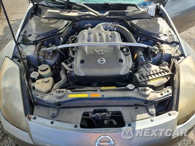 Zdjęcie 11 z 12 samochodu: 2004 NISSAN 350Z ENTHUSIAST VIN:JN1AZ36A14M252885 - miniatura
