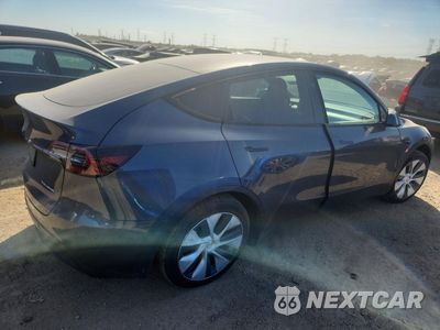 Trzecie zdjęcie samochodu z tyłu: 2023 TESLA MODEL Y VIN:7SAYGDEE9PF866272 - miniatura