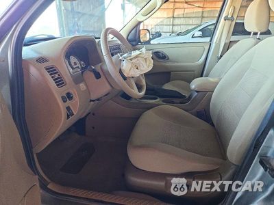 Zdjęcie 7 z 13 samochodu: 2006 FORD ESCAPE XLT VIN:1FMCU03126KB67586 - miniatura