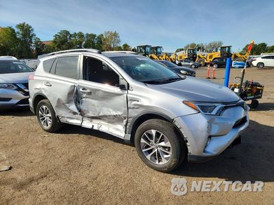 Czwarte zdjęcie samochodu z boku: 2018 TOYOTA RAV4 HYBRID XLE VIN:JTMRJREV2JD258205 - miniatura