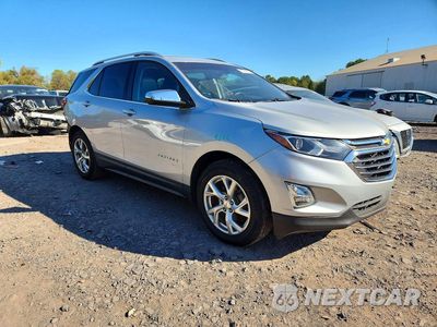 Czwarte zdjęcie samochodu z boku: 2018 CHEVROLET EQUINOX PREMIER VIN:2GNAXMEV4J6311622 - miniatura