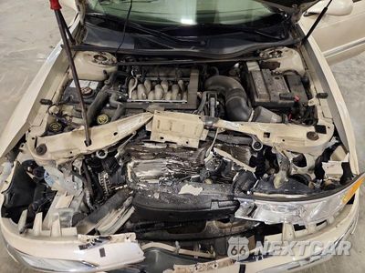 Zdjęcie 11 z 12 samochodu: 1999 LINCOLN CONTINENTAL VIN:1LNHM97V4XY718221 - miniatura