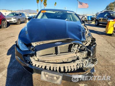 Piąte zdjęcie samochodu w środku: 2017 FORD FUSION SE HYBRID VIN:3FA6P0LU8HR299971 - miniatura