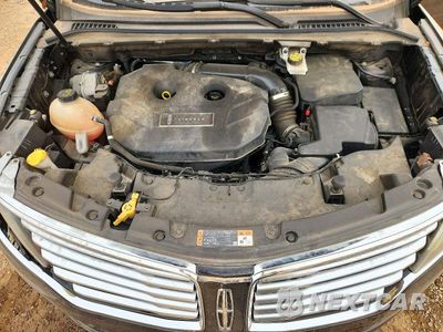 Zdjęcie 12 z 13 samochodu: 2017 LINCOLN MKC RESERVE VIN:5LMCJ3C96HUL50462 - miniatura