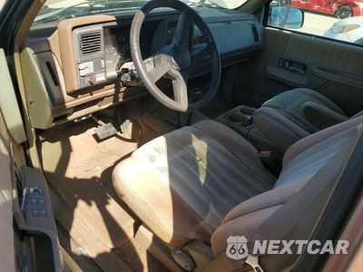Zdjęcie 8 z 13 samochodu: 1994 GMC SUBURBAN VIN:1GNFK16K4RJ420863 - miniatura