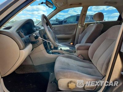 Zdjęcie 7 z 13 samochodu: 2000 MAZDA 626 ES VIN:1YVGF22C3Y5169387 - miniatura