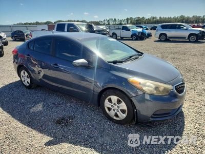 Czwarte zdjęcie samochodu z boku: 2016 KIA FORTE LX VIN:KNAFK4A6XG5597084 - miniatura