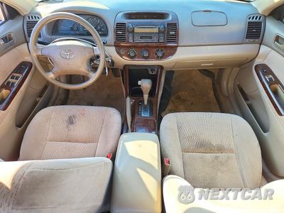 Zdjęcie 8 z 12 samochodu: 2003 TOYOTA CAMRY LE VIN:4T1BE32K43U136585 - miniatura