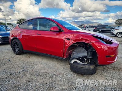 Czwarte zdjęcie samochodu z boku: 2022 TESLA MODEL Y VIN:7SAYGDEF4NF406216 - miniatura