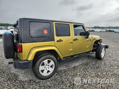 Trzecie zdjęcie samochodu z tyłu: 2010 JEEP WRANGLER UNLIMITED SAHARA VIN:1J4BA5H11AL220256 - miniatura