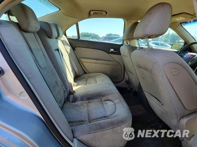 Zdjęcie 10 z 12 samochodu: 2010 FORD FUSION SE VIN:3FAHP0HA3AR392006 - miniatura