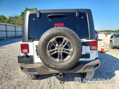 Zdjęcie 6 z 14 samochodu: 2016 JEEP WRANGLER UNLIMITED SAHARA VIN:1C4BJWEG9GL328508 - miniatura