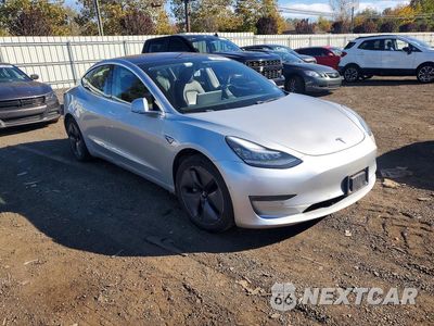 Czwarte zdjęcie samochodu z boku: 2018 TESLA MODEL 3 VIN:5YJ3E1EB8JF084893 - miniatura
