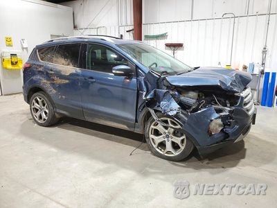 Czwarte zdjęcie samochodu z boku: 2018 FORD ESCAPE TITANIUM VIN:1FMCU9J90JUB06781 - miniatura