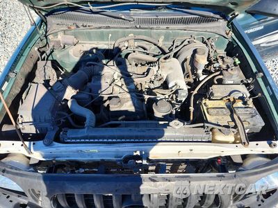 Zdjęcie 11 z 12 samochodu: 2001 TOYOTA TACOMA BASE VIN:5TENL42NX1Z734112 - miniatura
