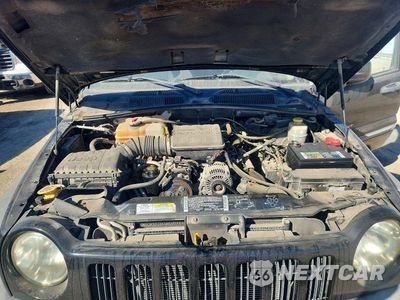 Zdjęcie 11 z 12 samochodu: 2002 JEEP LIBERTY SPORT VIN:1J4GL48K62W136730 - miniatura