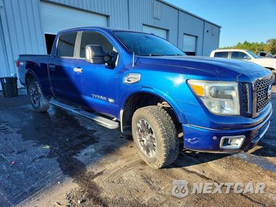 Czwarte zdjęcie samochodu z boku: 2017 NISSAN TITAN XD PRO-4X VIN:1N6BA1F49HN507383 - miniatura
