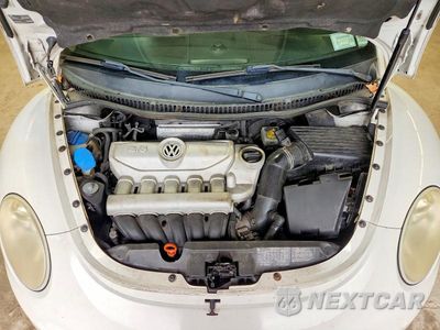 Zdjęcie 11 z 12 samochodu: 2010 VOLKSWAGEN NEW BEETLE VIN:3VWRG3AL4AM009535 - miniatura