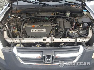 Zdjęcie 11 z 12 samochodu: 2002 HONDA CR-V EX VIN:JHLRD78802C000132 - miniatura