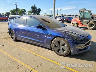 Czwarte zdjęcie samochodu z boku: 2023 TESLA MODEL 3 VIN:5YJ3E1EA3PF542534 - miniatura