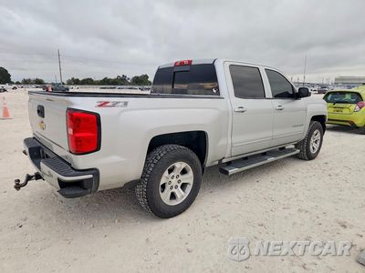 Trzecie zdjęcie samochodu z tyłu: 2017 CHEVROLET SILVERADO K1500 LT VIN:3GCUKRECXHG344932 - miniatura
