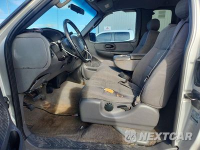 Zdjęcie 7 z 13 samochodu: 2002 FORD F150 VIN:2FTRX07L02CA81080 - miniatura