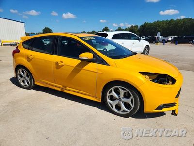 Czwarte zdjęcie samochodu z boku: 2013 FORD FOCUS ST VIN:1FADP3L94DL168114 - miniatura