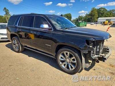Czwarte zdjęcie samochodu z boku: 2015 CHEVROLET TAHOE C1500 LTZ VIN:1GNSCCKC7FR574017 - miniatura