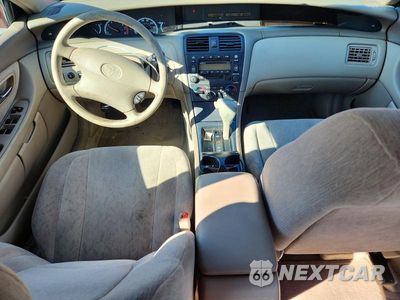 Zdjęcie 8 z 12 samochodu: 2000 TOYOTA AVALON XL VIN:4T1BF28B9YU042286 - miniatura