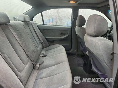 Zdjęcie 10 z 13 samochodu: 2005 HYUNDAI ELANTRA GLS VIN:KMHDN46D65U078122 - miniatura