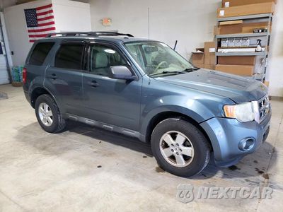 Czwarte zdjęcie samochodu z boku: 2011 FORD ESCAPE XLT VIN:1FMCU9DG0BKB99549 - miniatura