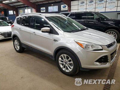 Czwarte zdjęcie samochodu z boku: 2016 FORD ESCAPE TITANIUM VIN:1FMCU9JX9GUB42671 - miniatura