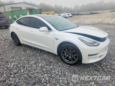 Czwarte zdjęcie samochodu z boku: 2019 TESLA MODEL 3 VIN:5YJ3E1EA0KF407617 - miniatura