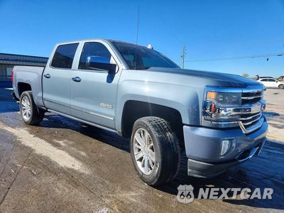 Czwarte zdjęcie samochodu z boku: 2016 CHEVROLET SILVERADO K1500 HIGH COUNTRY VIN:3GCUKTEC7GG160527 - miniatura