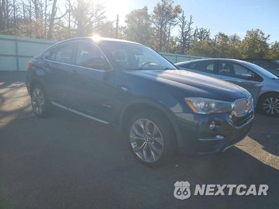Czwarte zdjęcie samochodu z boku: 2016 BMW X4 XDRIVE28I VIN:5UXXW3C5XG0R20474 - miniatura
