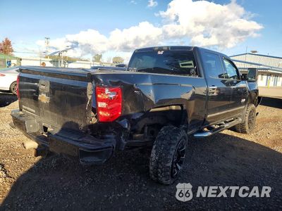 Trzecie zdjęcie samochodu z tyłu: 2018 CHEVROLET SILVERADO K2500 HEAVY DUTY LT VIN:1GC1KVEG7JF232417 - miniatura