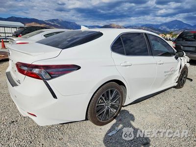 Trzecie zdjęcie samochodu z tyłu: 2022 TOYOTA CAMRY HYBRID SE VIN:4T1G31AK4NU581039 - miniatura