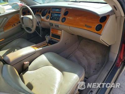Zdjęcie 8 z 12 samochodu: 1998 BUICK RIVIERA VIN:1G4GD2212W4707327 - miniatura