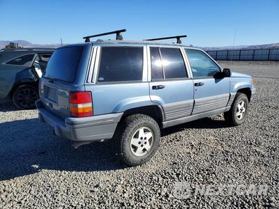 Trzecie zdjęcie samochodu z tyłu: 1995 JEEP GRAND CHEROKEE LAREDO VIN:1J4GZ58YXSC765157 - miniatura