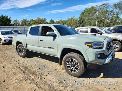 Czwarte zdjęcie samochodu z boku: 2022 TOYOTA TACOMA TRD SPORT VIN:3TMCZ5AN1NM525888 - miniatura