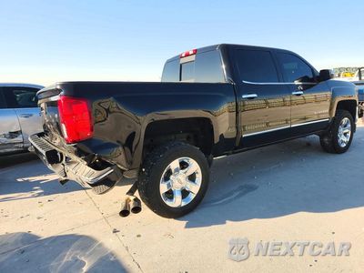 Trzecie zdjęcie samochodu z tyłu: 2018 CHEVROLET SILVERADO C1500 LTZ VIN:3GCPCSEC0JG207988 - miniatura