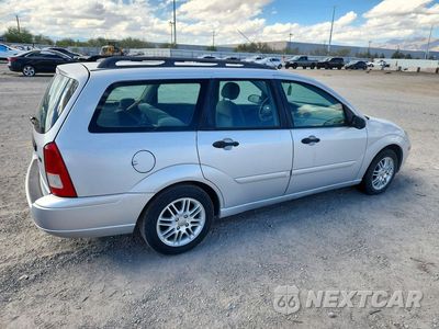 Trzecie zdjęcie samochodu z tyłu: 2003 FORD FOCUS SE VIN:1FAFP36343W330899 - miniatura