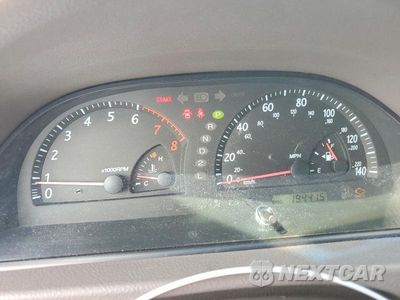 Zdjęcie 9 z 13 samochodu: 2004 TOYOTA CAMRY LE VIN:JTDBE32K540262774 - miniatura