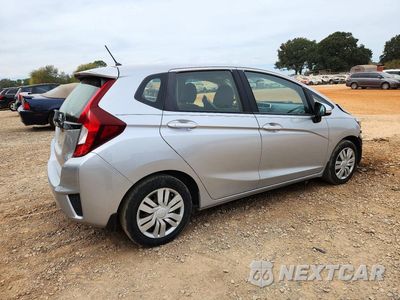 Trzecie zdjęcie samochodu z tyłu: 2016 HONDA FIT LX VIN:JHMGK5H52GS008622 - miniatura