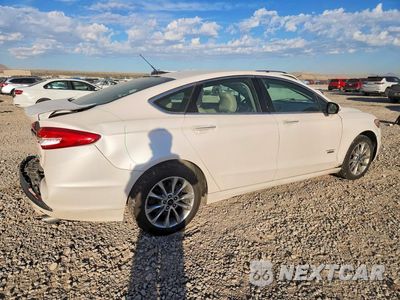 Trzecie zdjęcie samochodu z tyłu: 2017 FORD FUSION SE PHEV VIN:3FA6P0PU4HR285088 - miniatura