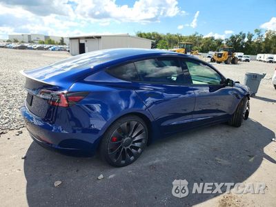 Trzecie zdjęcie samochodu z tyłu: 2021 TESLA MODEL 3 VIN:5YJ3E1EC8MF013416 - miniatura