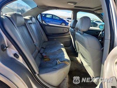 Zdjęcie 10 z 13 samochodu: 2001 NISSAN MAXIMA GXE VIN:JN1CA31D11T624888 - miniatura