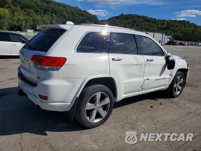 Trzecie zdjęcie samochodu z tyłu: 2014 JEEP GRAND CHEROKEE OVERLAND VIN:1C4RJFCG0EC233379 - miniatura